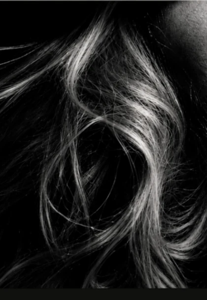 Glossy textured hair from the approved QiQi visual reference